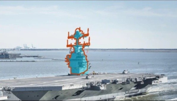 Real photo of USS Gerald R. Ford with outlines